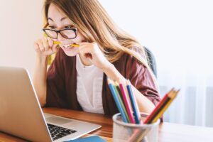 Student checking JEECUP Result 2025 on laptop